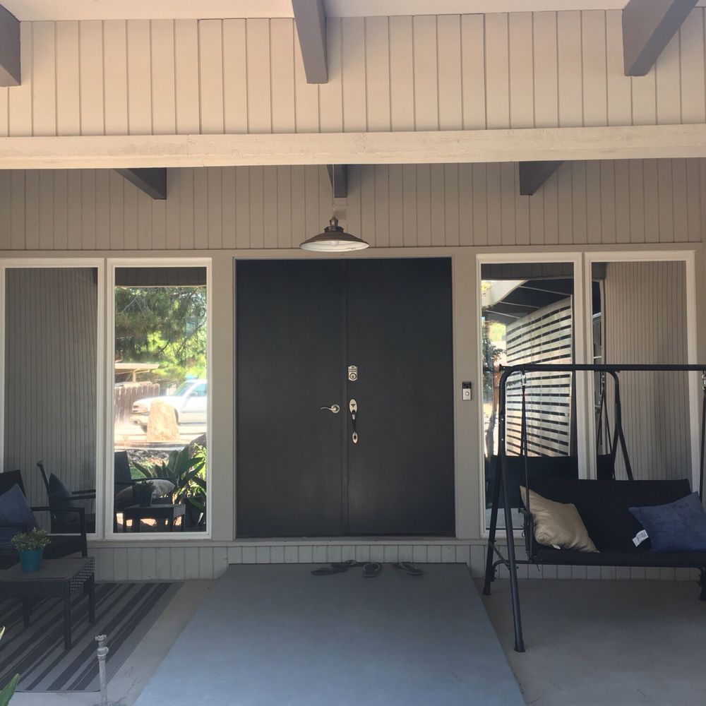Tinted mirror windows on the outside of my house.