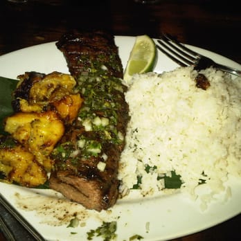 Cuban Pete's - Churrasco (marinated and grilled skirt steak with spicy chimichurri sauce, rice, black beans on the side, plantains). DELICIOUS - Cuban Near Me - Montclair, New Jersey