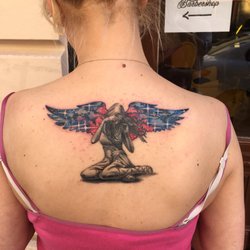 Barbershop & Tattoo Good Times - Angel tattoo by Pavel Steinhauser