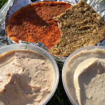 Sahadi's - Hummus on the right, spicy on the left. Two flavored Pitas from the bakery - International Grocery Near Me - Brooklyn, New York Sahadi's - Hummus on the right, spicy on the left. Two flavored Pitas from the bakery - International Grocery Near Me - Brooklyn, New York
