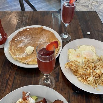 Seven Mile Cafe - Mimosa, pancakes, hash brown and eggs. Eggs Benedict - Breakfast & Brunch Near Me - Mesquite, Texas Seven Mile Cafe - Mimosa, pancakes, hash brown and eggs. Eggs Benedict - Breakfast & Brunch Near Me - Mesquite, Texas