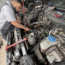 Reynas Automotive - Technician working