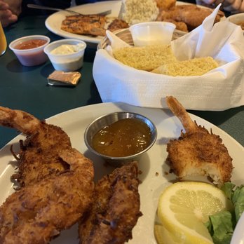 Salmon Bake Restaurant - Coconut shrimp in the front and captains platter in back with corn bread and honey butter - American Near Me - Seward, Alaska