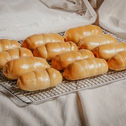 Pan Pa ti bakery - Venezuelan Cachitos are delightful pastry rolls filled with smoked ham, White Panela cheese, Turkey and cream cheese or Smoked ham & Cheese