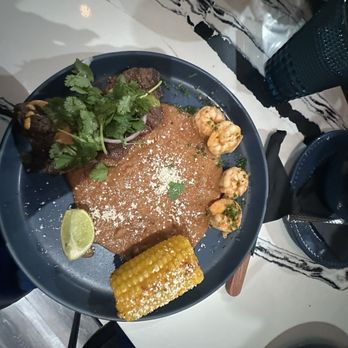 Octopus Baja - A huge plate of beans with some shrimp, a grilled cob of corn, and the toughest piece of skirt steak hiding - Seafood Near Me - Sacramento, California