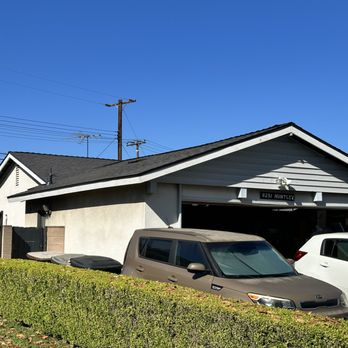 Green Home Builders - two cars parked in front of a garage - General Contractors Near Me - Carson, California