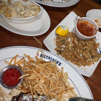 J. Alexander's - Steak and fries Calamari Mac and cheese Filet mignon With baked potato - Steakhouses Near Me - Plantation, Florida J. Alexander's - Steak and fries Calamari Mac and cheese Filet mignon With baked potato - Steakhouses Near Me - Plantation, Florida