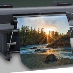 Happy Print - Our Canon ipf8400 Large Format Color printer can pump out everything from architecturals, to photographs, to vinyl banners.