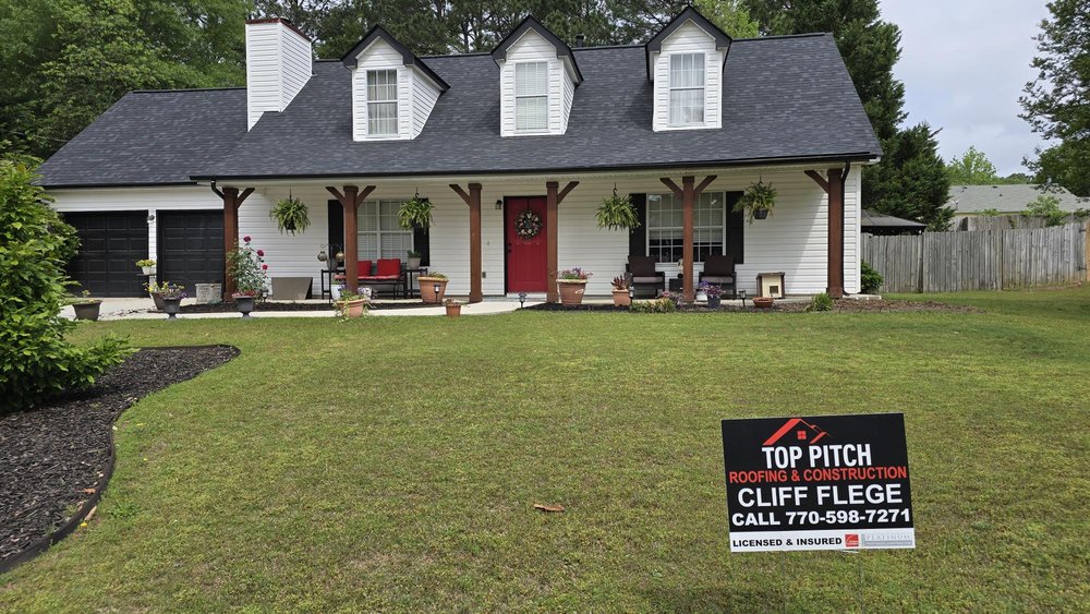 Slide of Top Pitch Roofing