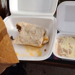 Las Minas Mexican Restaurant - Flour chips, a burrito with only meat, and beans with cheese on top. $21