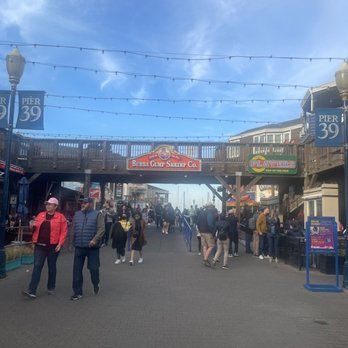 PIER 39 - The entrance after the flags at Pier 39. There is a bottom and top level. (2 levels) - Shopping Centers Near Me - San Francisco, California