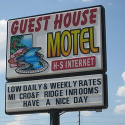 Guest House Motor Inn - Sign