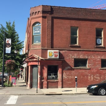 Locust Tap - a car parked in front of a brick building - Bars Near Me - Des Moines, Iowa Locust Tap - a car parked in front of a brick building - Bars Near Me - Des Moines, Iowa
