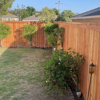 Ramirez Fence Company - Backyard redwood fence with cap trim. - Fences & Gates Near Me Ramirez Fence Company - Backyard redwood fence with cap trim. - Fences & Gates Near Me