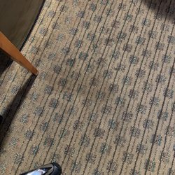 Quality Inn & Suites - Stains everywhere I'm the carpet