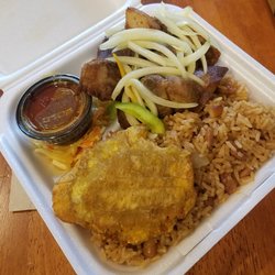 A E Caribbean Cafe & Bakery - Fried Pork, rice and peas, pickled cabbage, plantain, onions