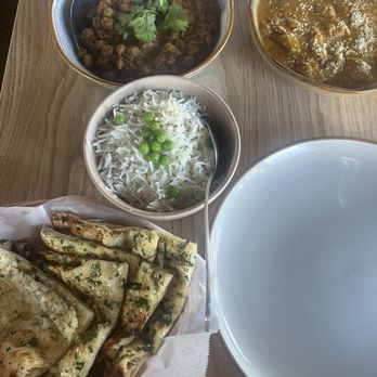 Noor Indian Fusion Kitchen - The whole meal, 6 pieces of garlic cheese naan (best naan ever), the rice, garbanzo and chicken korma - Indian Near Me - Berkeley, California Noor Indian Fusion Kitchen - The whole meal, 6 pieces of garlic cheese naan (best naan ever), the rice, garbanzo and chicken korma - Indian Near Me - Berkeley, California