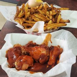 Big Fella's Pizza Deli & Wings - Jamaican BBQ wings, cajun fries, with cheese.