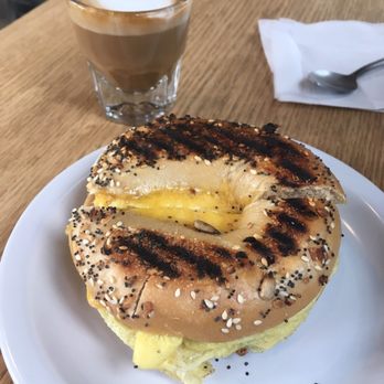 Seven Virtues Coffee Roasters - Bagelwich: egg and cheese on everything bagel - Coffee & Tea Near Me - Portland, Oregon Seven Virtues Coffee Roasters - Bagelwich: egg and cheese on everything bagel - Coffee & Tea Near Me - Portland, Oregon