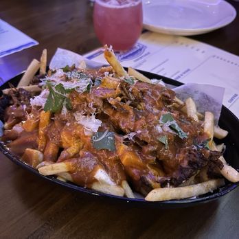 Oribello’s Bar & Kitchen - Birria poutine - Sports Bars Near Me - Austin, Texas Oribello’s Bar & Kitchen - Birria poutine - Sports Bars Near Me - Austin, Texas