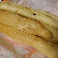Little Caesar's Pizza - These are good to snack on, regular bread sticks..