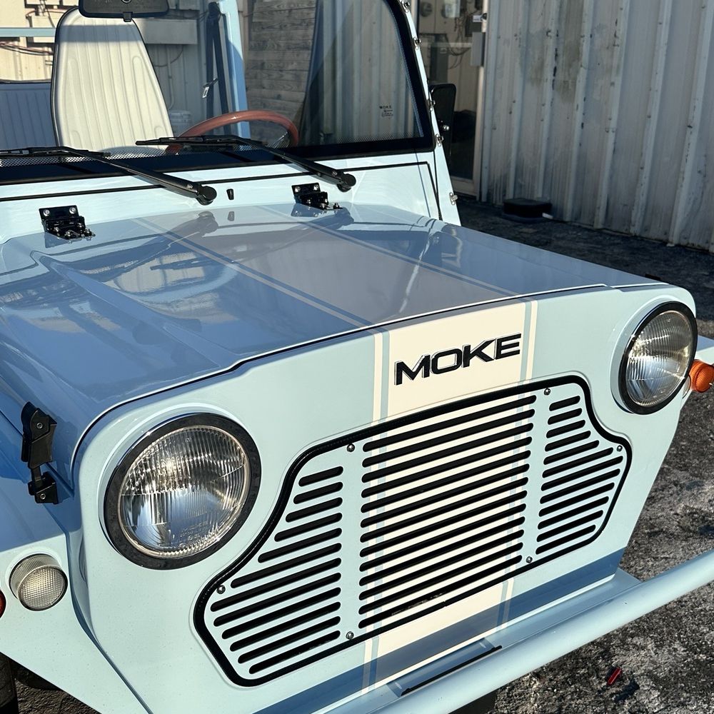Luxury Car Wrap - Moke with custom racing stripe. Very well done. - Auto Detailing Near Me - Naples, Florida Luxury Car Wrap - Moke with custom racing stripe. Very well done. - Auto Detailing Near Me - Naples, Florida