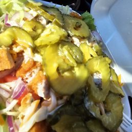 a salad in a styrofoam container a salad in a styrofoam container