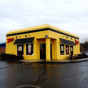 Zip's Drive In - a yellow building with a black awning - Fast Food Near Me - Lewiston, Idaho Zip's Drive In - a yellow building with a black awning - Fast Food Near Me - Lewiston, Idaho