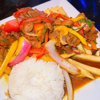 Sol De Oro - a plate of food on a table - Steakhouses Near Me - Lake Placid, New York Sol De Oro - a plate of food on a table - Steakhouses Near Me - Lake Placid, New York