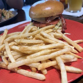 The Kitchen by Wolfgang Puck - a hamburger and french fries - American Near Me - Sterling, Virginia The Kitchen by Wolfgang Puck - a hamburger and french fries - American Near Me - Sterling, Virginia