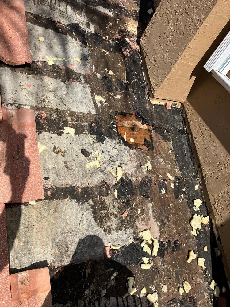 Slide of Roof Leak Hunters