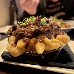 Charm Bar & Restaurant - Signature Mac & Cheese with Oxtail.