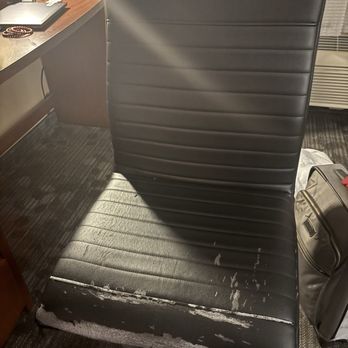 Courtyard by Marriott Denver Cherry Creek - Room chair ripped and tearing. How old is this? - Hotels Near Me - Denver, Colorado