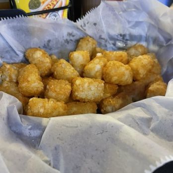 Fletcher’s Irish Pub & Brewery - Perfect tots.  Condiments thoughtfully provided.  I tried with malt vinegar for the first time, a nice touch. - Pubs Near Me - Holly Hill, Florida