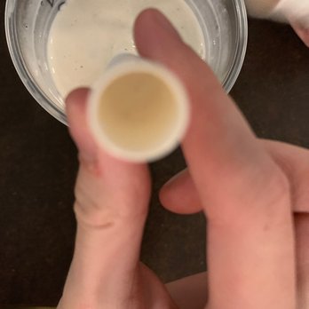 Sweet Cow - a person holding a cup of milk - Ice Cream & Frozen Yogurt Near Me - Boulder, Colorado Sweet Cow - a person holding a cup of milk - Ice Cream & Frozen Yogurt Near Me - Boulder, Colorado