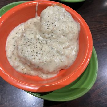 Tucker's - Side of Sausage Gravy with a grilled biscuit. - Wraps Near Me - Dover, New Hampshire Tucker's - Side of Sausage Gravy with a grilled biscuit. - Wraps Near Me - Dover, New Hampshire