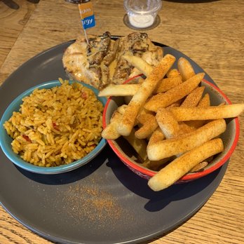 Nando's - Medium Chicken Butterfly with Peri Chips and Spicy Rice £10.30 - Chicken Shop Near Me - Ashton-under-Lyne, XGM