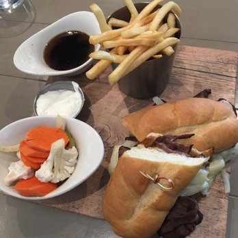 21 Square Bar + Kitchen - The French Dip: Shaved Beef, Caramelized onions, Provolone. Side of fries, au ju sauce, lemon garlic aioli, and pickled vegetables. - Bars Near Me - Torrance, California 21 Square Bar + Kitchen - The French Dip: Shaved Beef, Caramelized onions, Provolone. Side of fries, au ju sauce, lemon garlic aioli, and pickled vegetables. - Bars Near Me - Torrance, California