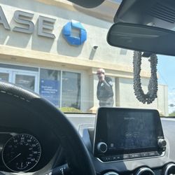 Chase Bank - Allied Universal employee taking a phone call