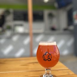a glass of beer on a table
