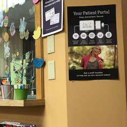 Front desk. Signage for check-in and patient portal.