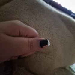 Walton Nails & Spa - The glued on tip wasn't pressed down all the way and snapped.