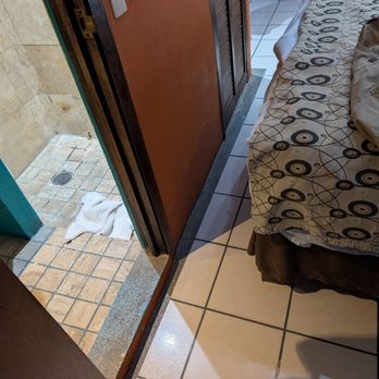 Hotel Playa Los Arcos - Tight space between bed and super small bathroom. - Hotels Near Me - Puerto Vallarta, JAL