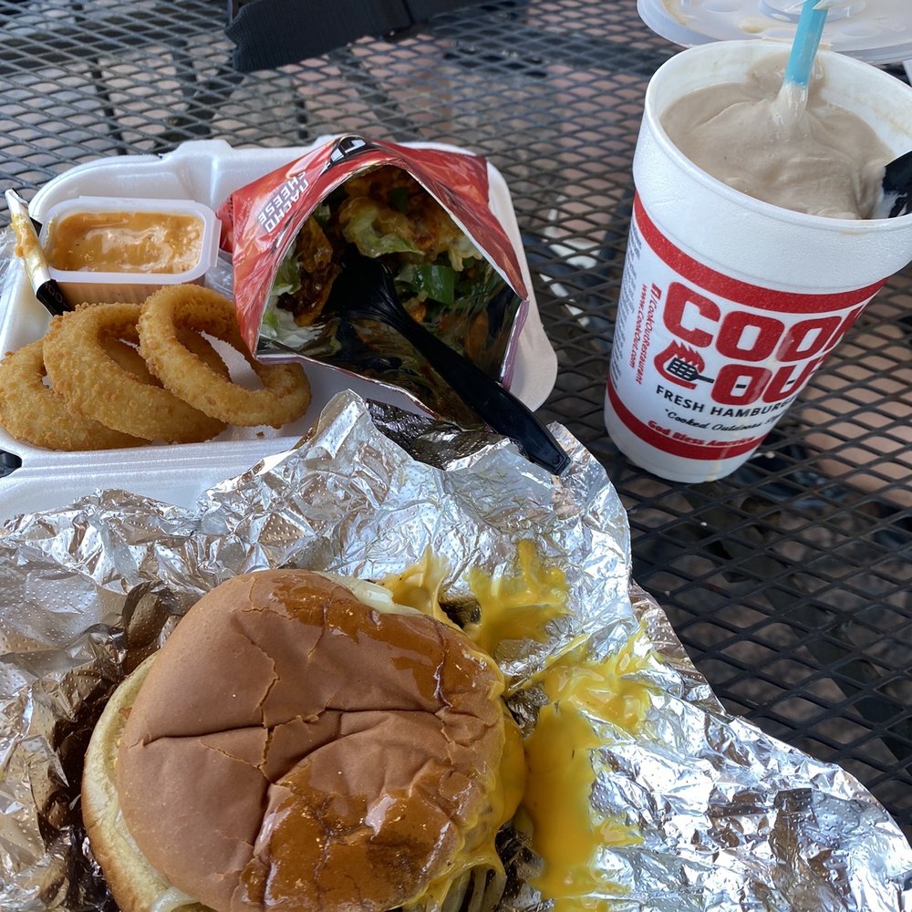 Double burger cheddar style with onion rings , walking taco and chocolate malt Double burger cheddar style with onion rings , walking taco and chocolate malt