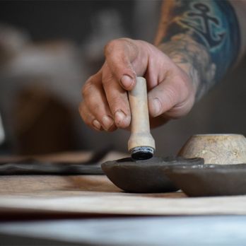 Gravesco Pottery - Rebecca stamping handmade clay mise en place - Home Decor Near Me - Indianapolis, Indiana