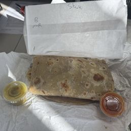 Asada Steak Onion Burritos with the red and green sauce. I prefer the green.