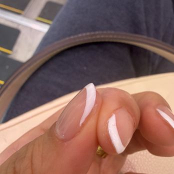 Sassy Nails Care - Gap and red smudge on white polish - Nail Salons Near Me - San Francisco, California