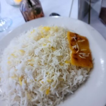 Nasrin’s Kitchen - Basmati rice (with a piece of tahdig/scorched rice) with my main - Persian/Iranian Near Me - New York, New York Nasrin’s Kitchen - Basmati rice (with a piece of tahdig/scorched rice) with my main - Persian/Iranian Near Me - New York, New York