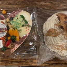 Valentine's Day charcuterie board and freshly baked sour dough bread. Valentine's Day charcuterie board and freshly baked sour dough bread.