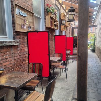 Cafe Bubamara - Additional seating along side of restaurant heading towards back seating area - Modern European Near Me - Clifton, New Jersey